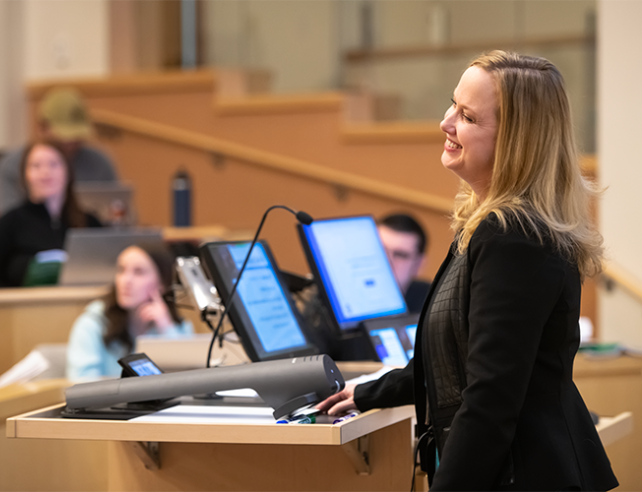 teacher at podium