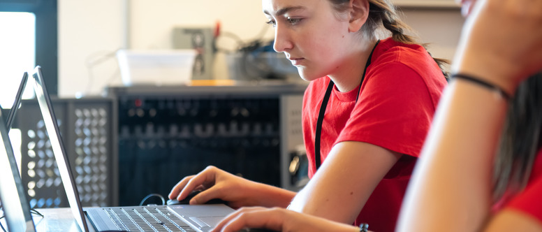 Person reading from a laptop