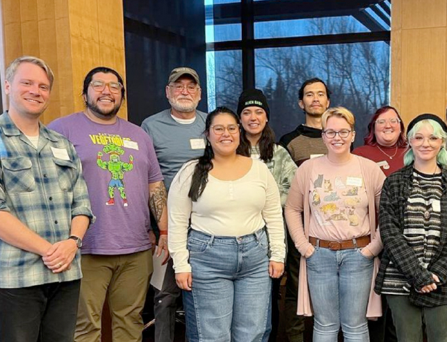 Restorative justice students standing and smiling