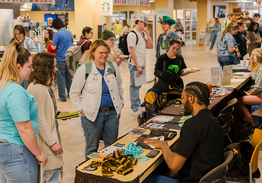 Participants visit with community organizations in the Wyoming Union Breezeway