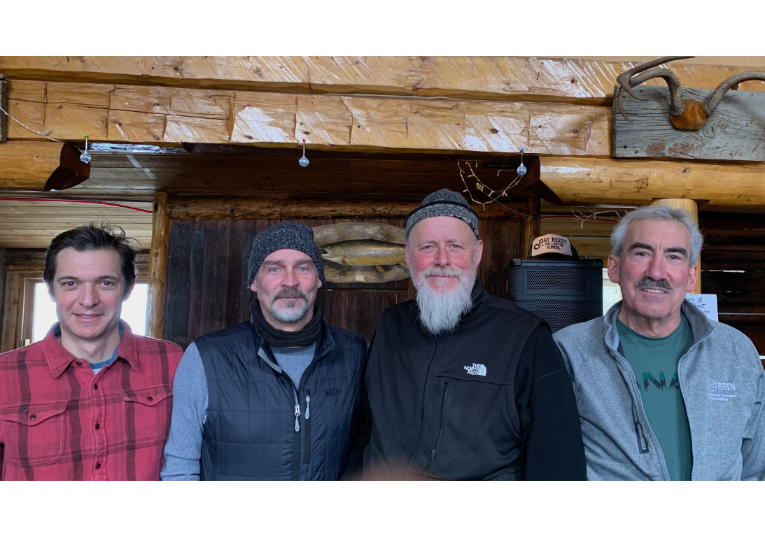 Four professors at the center retreat