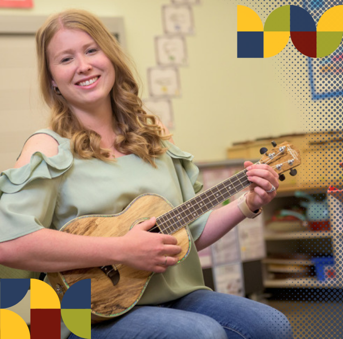 Student teacher playing a guitar