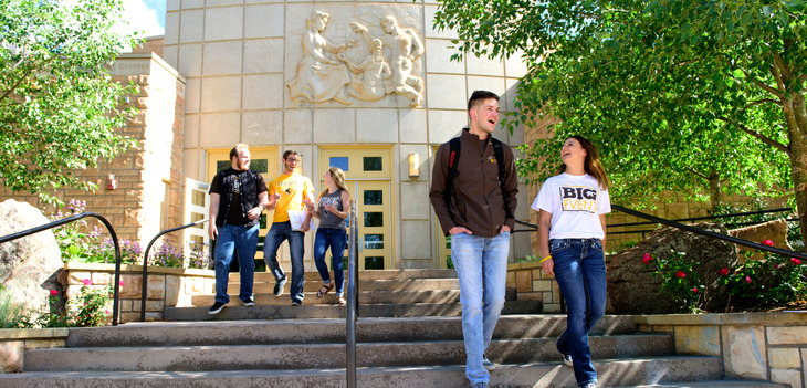 students gathered on the college of educations front steps