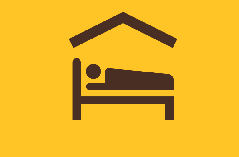 person sleeping on a bed under a roof