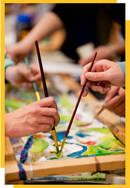 teacher & student painting together
