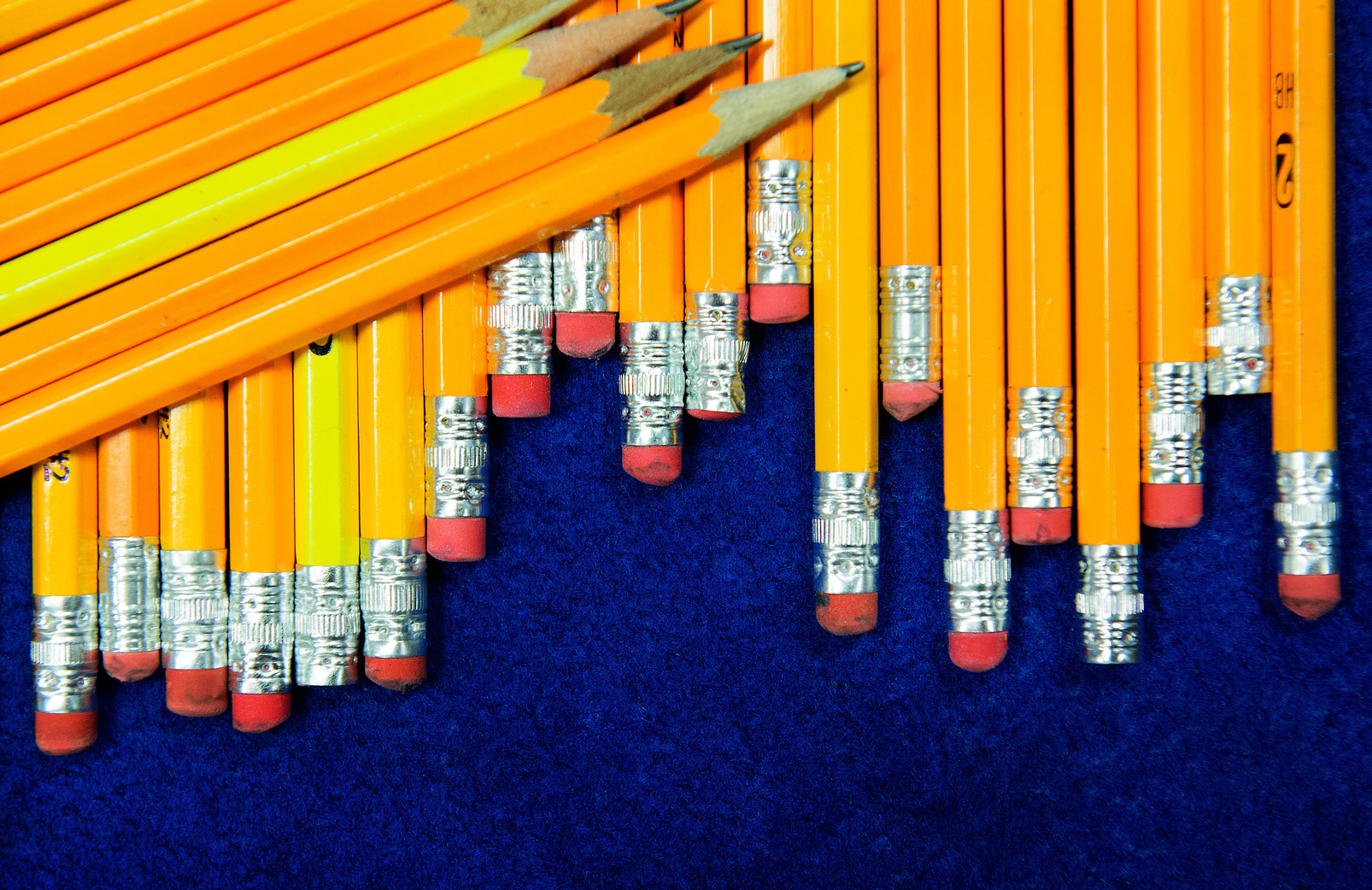 Pencils on a blue background