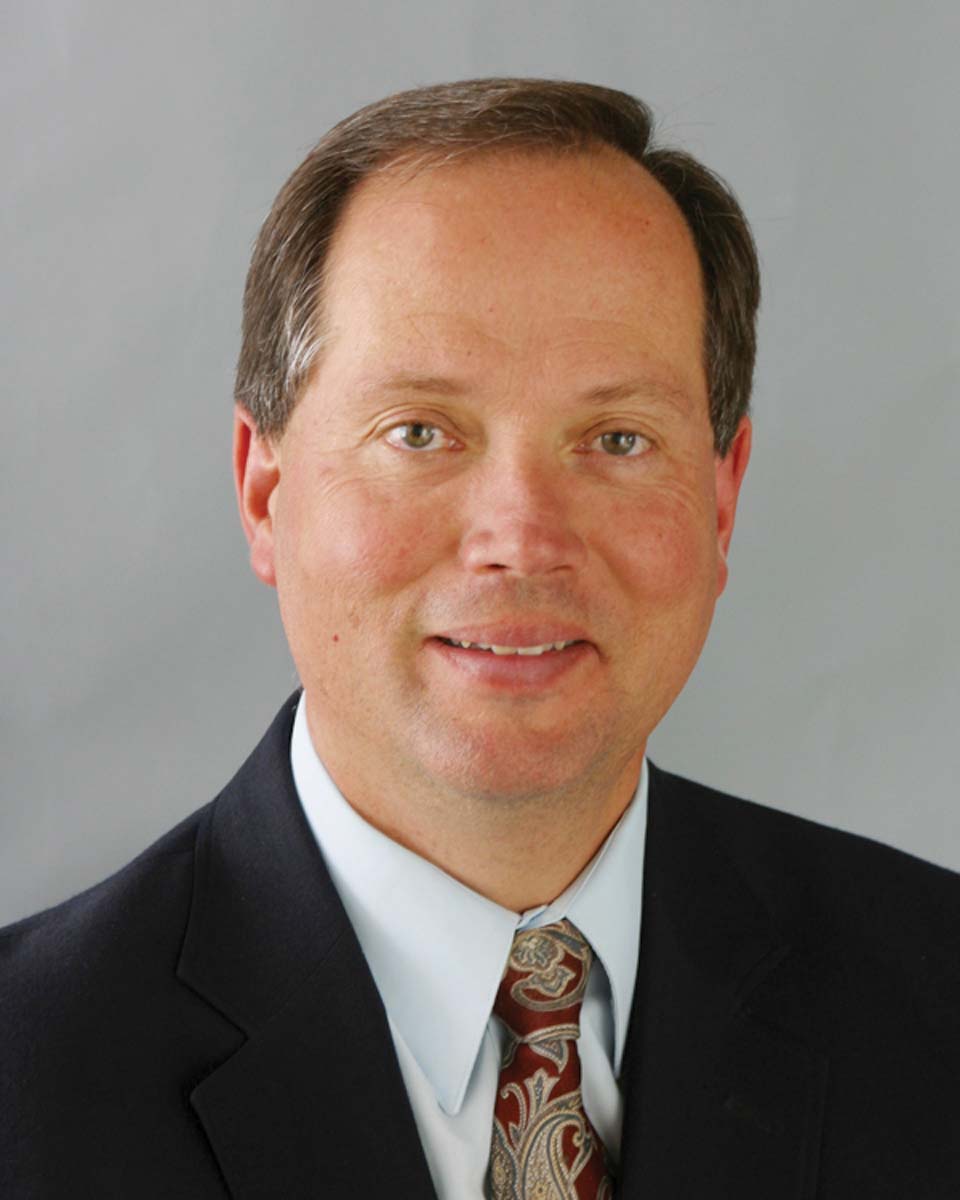 headshot of a college of education dean