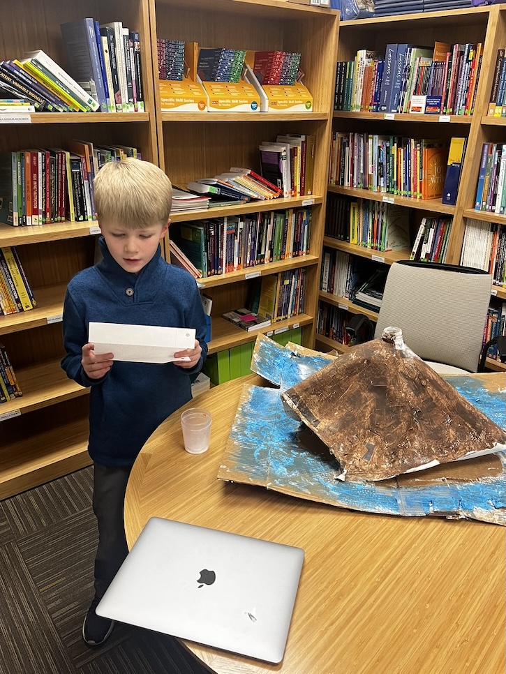 student presenting a project