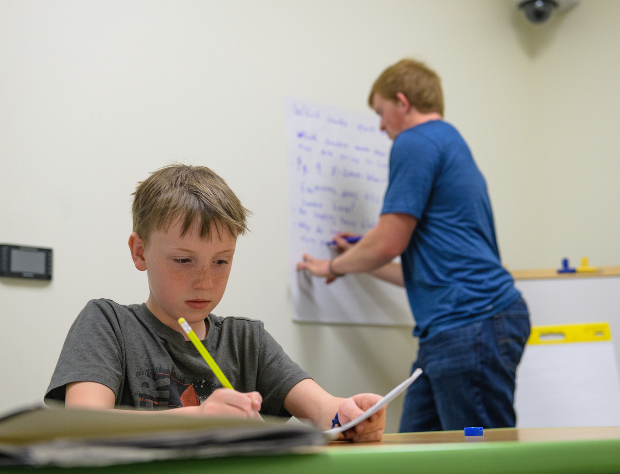 Two elementary students working on homework