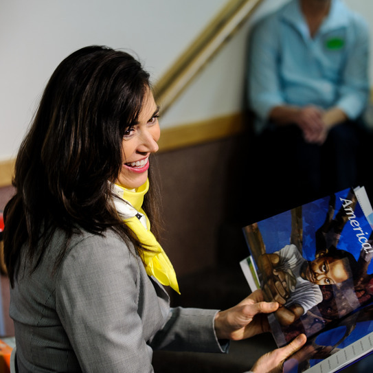 First lady Carol Mead reading to students