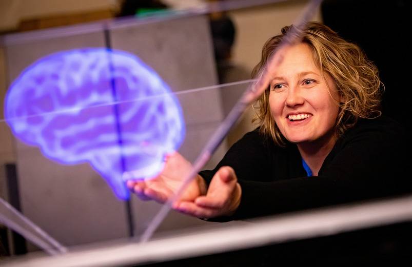 Amy Banic with Brain Hologram