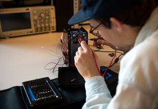 student tinkering