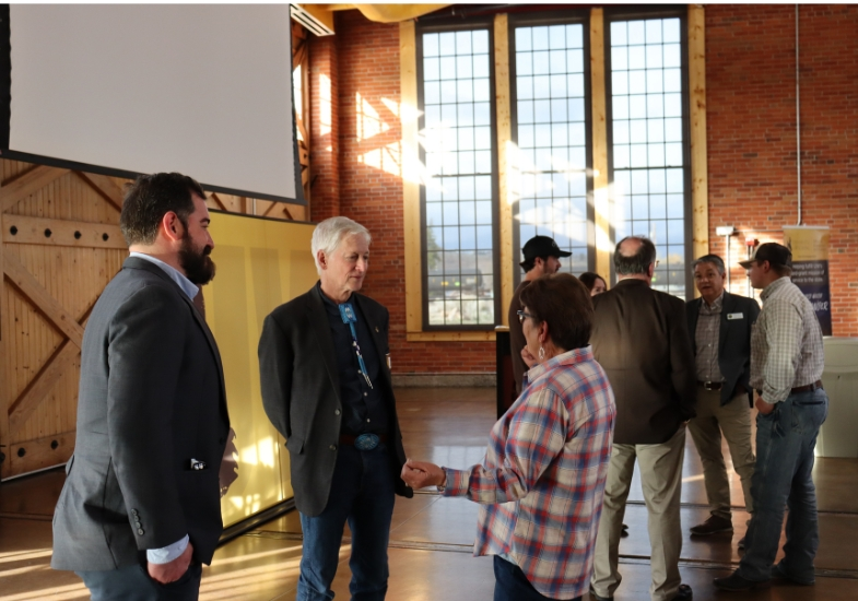Former UW President Ed Seidel talking with Wyoming community members at an event