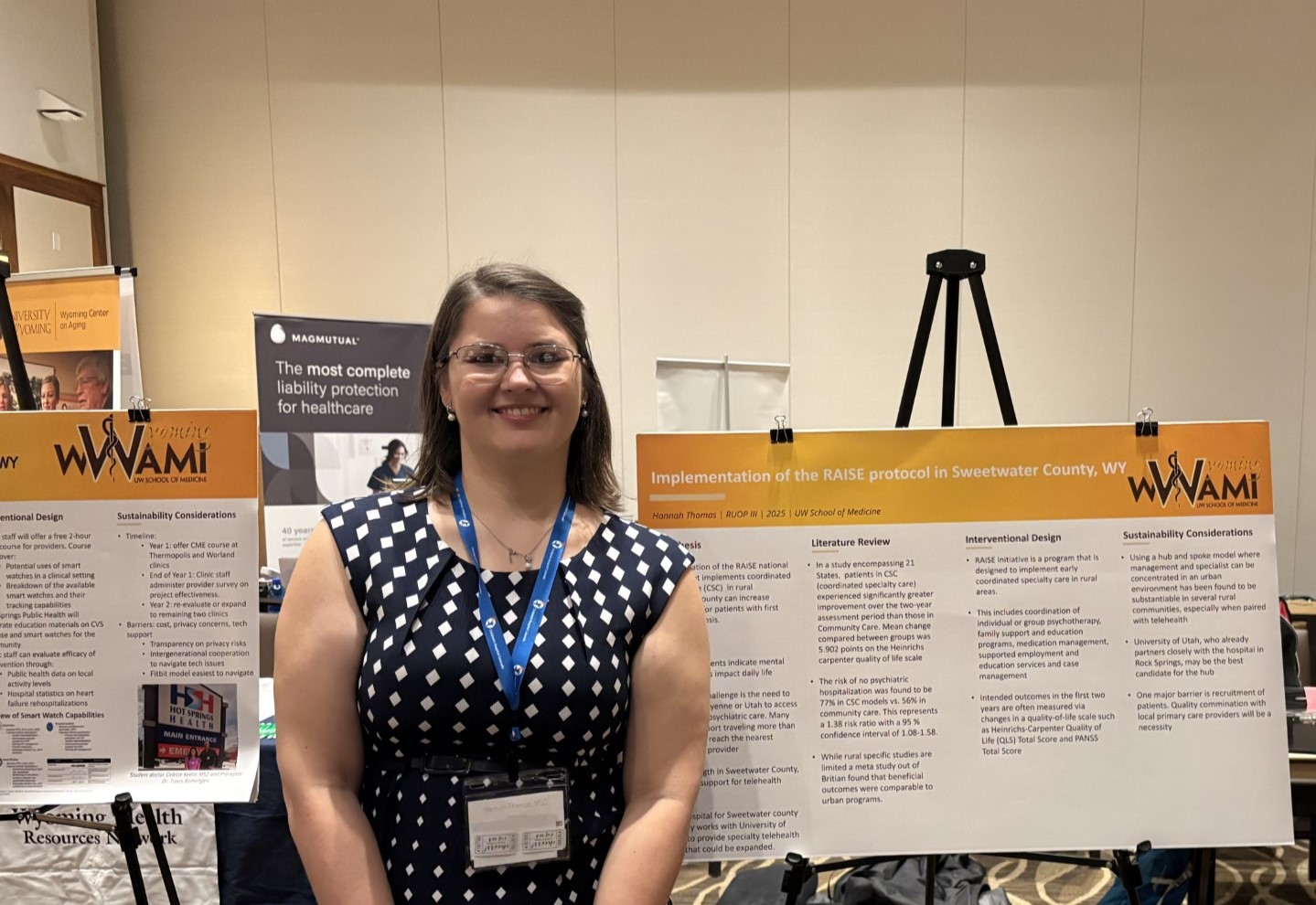 Student presenting a poster