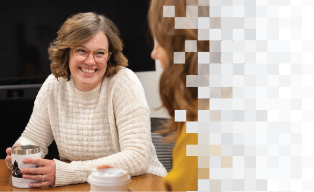 Two women talking and laughing