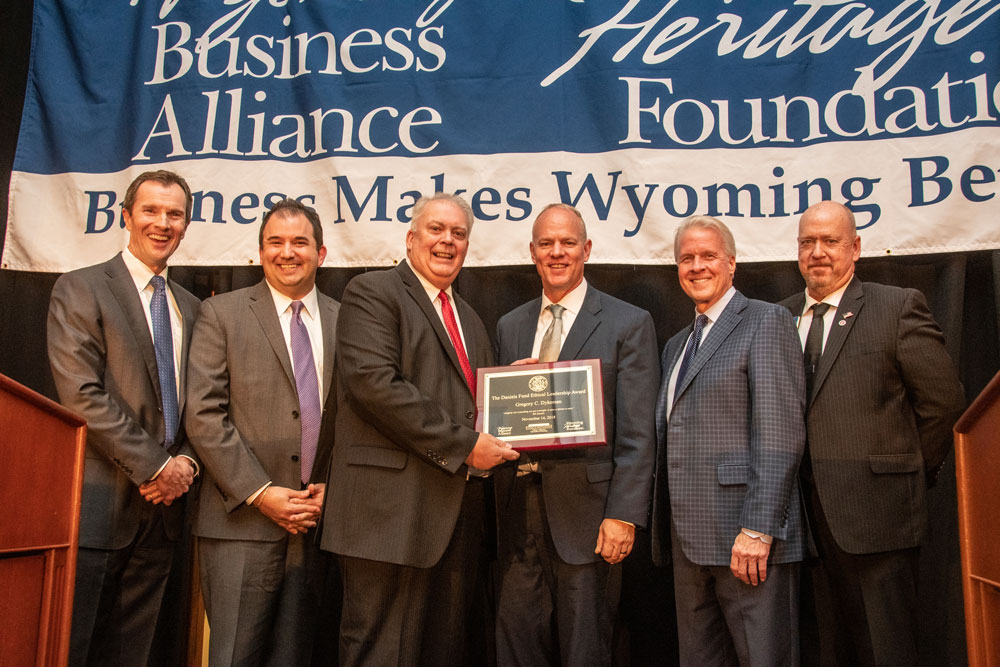 greg dyekman recieving an award