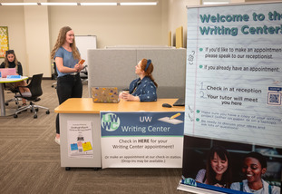A UW student checks in for a tutoring session at the University of Wyoming Writing Center.