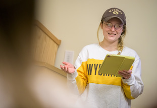 A UW student gives a presentation during a class at the University of Wyoming.
