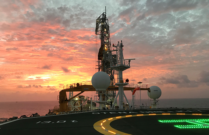 Will White's oil rig at sunset
