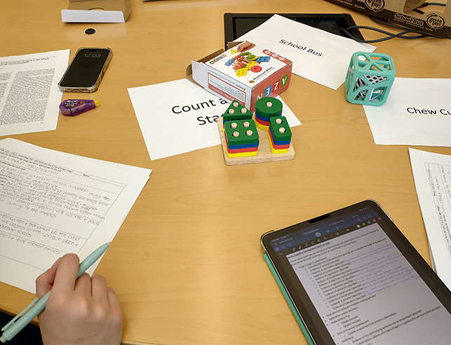 several children's toys being evaluated by family and consumer sciences students in the human development and family sciences program
