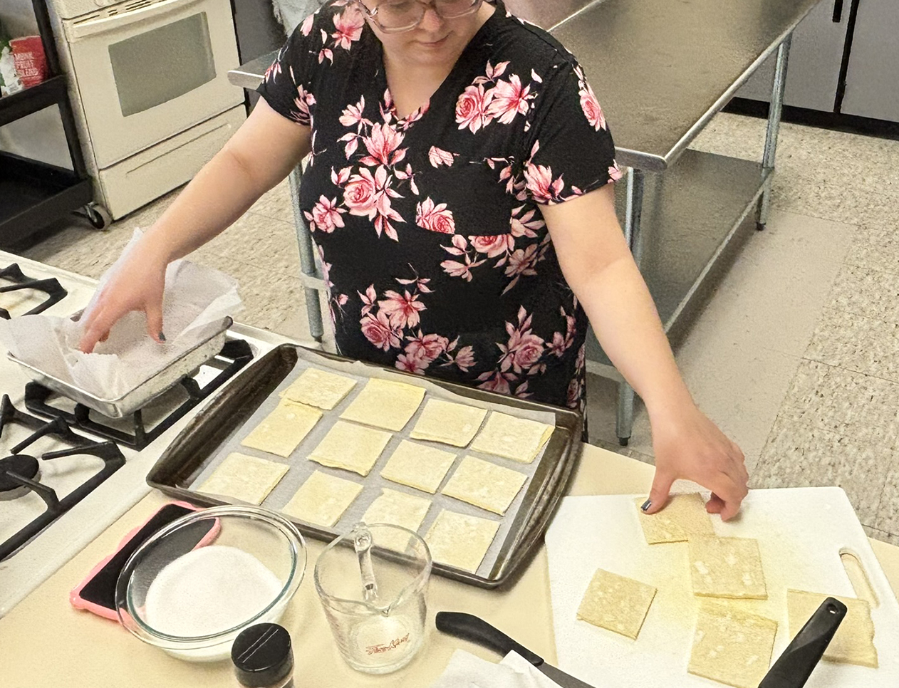 a family and consumer sciences student cooking churros in our teaching kitchen