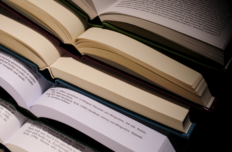 a stack of family and consumer sciences books