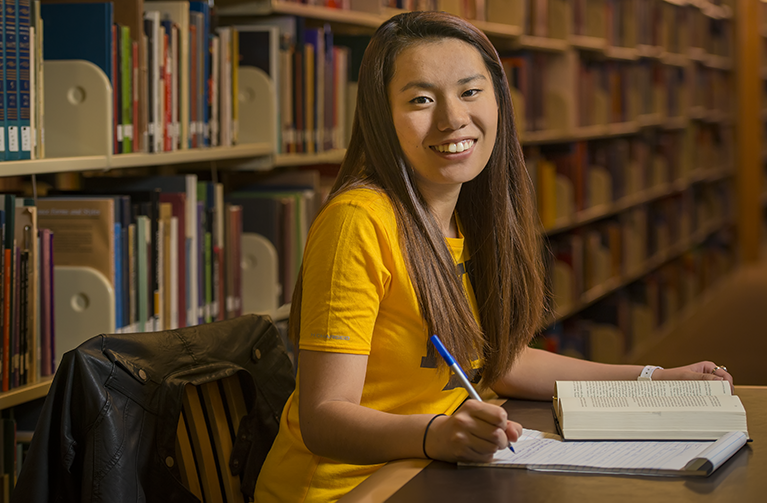 a family and consumer sciences undergraduate student at the library