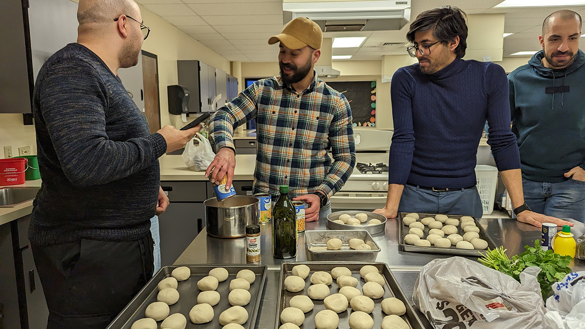 several students from the middle-eastern and north african studies program preparing ethnic food