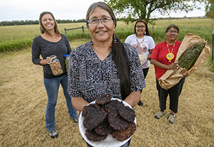 three tribal elders and family and consumer sciences faculty member dr. jill keith