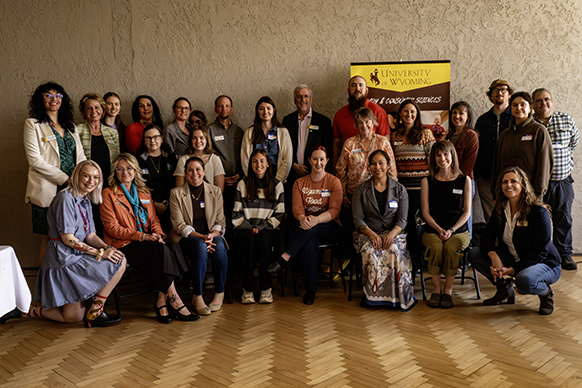 group photo of the hunger in wyoming meeting in laramie