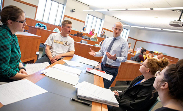 Professor Chase Thiel with students