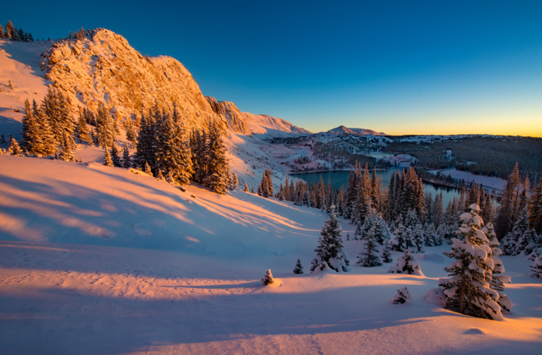 sunset on Snowy Range mountains