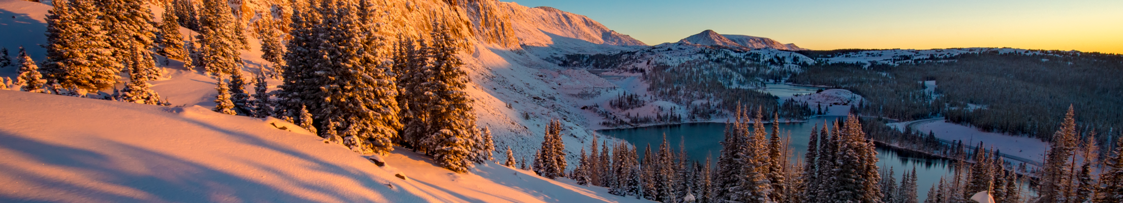 sunset on snowy mountains