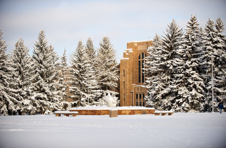 UW building and Prexies Pasture covered in snow