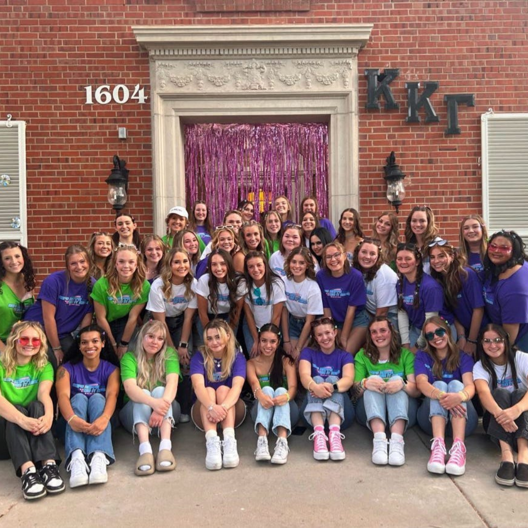 Girls in front of house