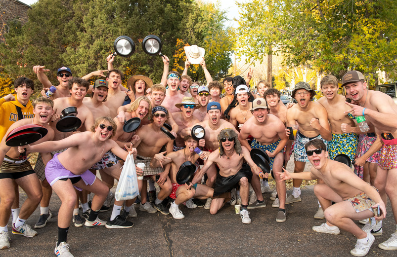 A group of UW fraternity members enthusiastically participate in UW Homecoming events
