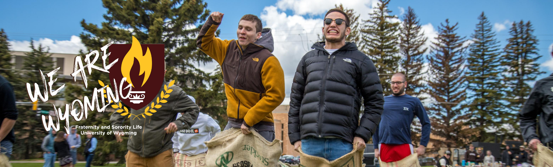 Brothers from various fraternities participate in a race with FSL logo