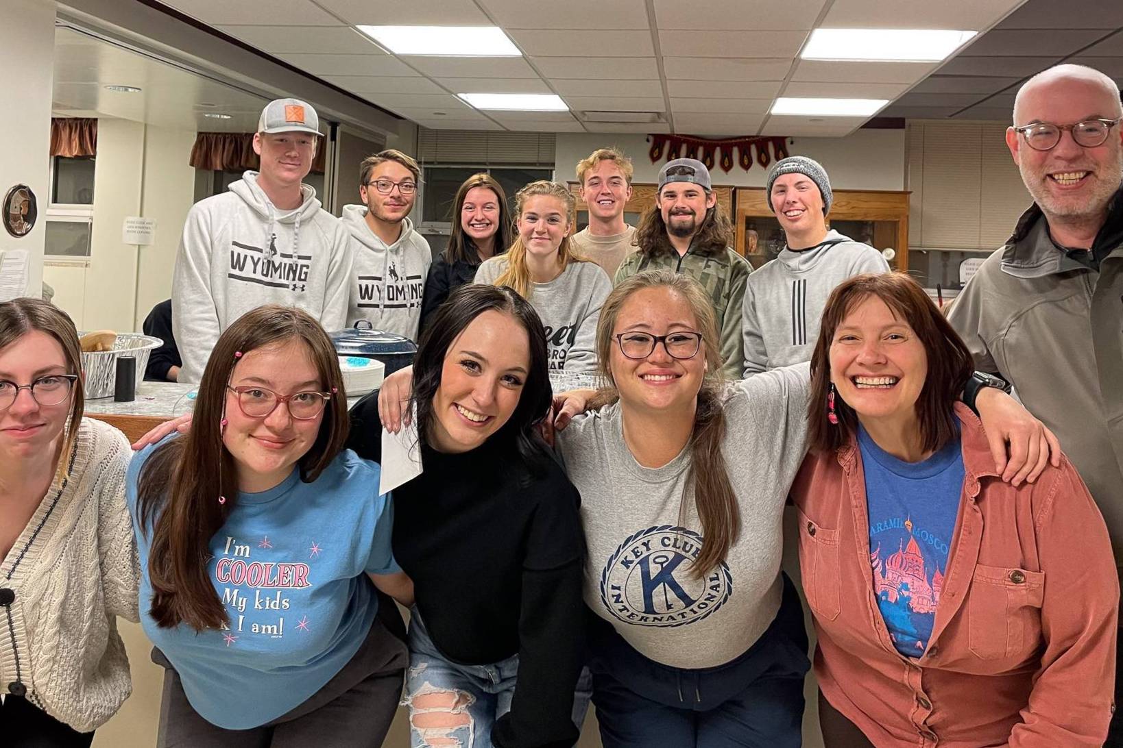 Students pose after spaghetti fundraiser for Karma Fund