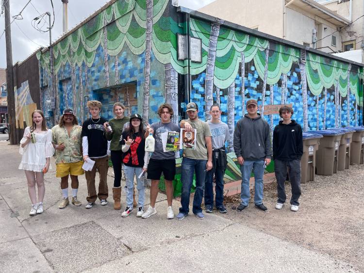 2023 STEP 1000 class in front of downtown murals