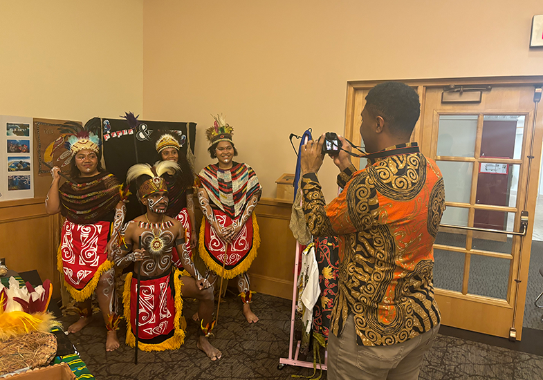 Papuan Indonesian Night performers pose for a photograph