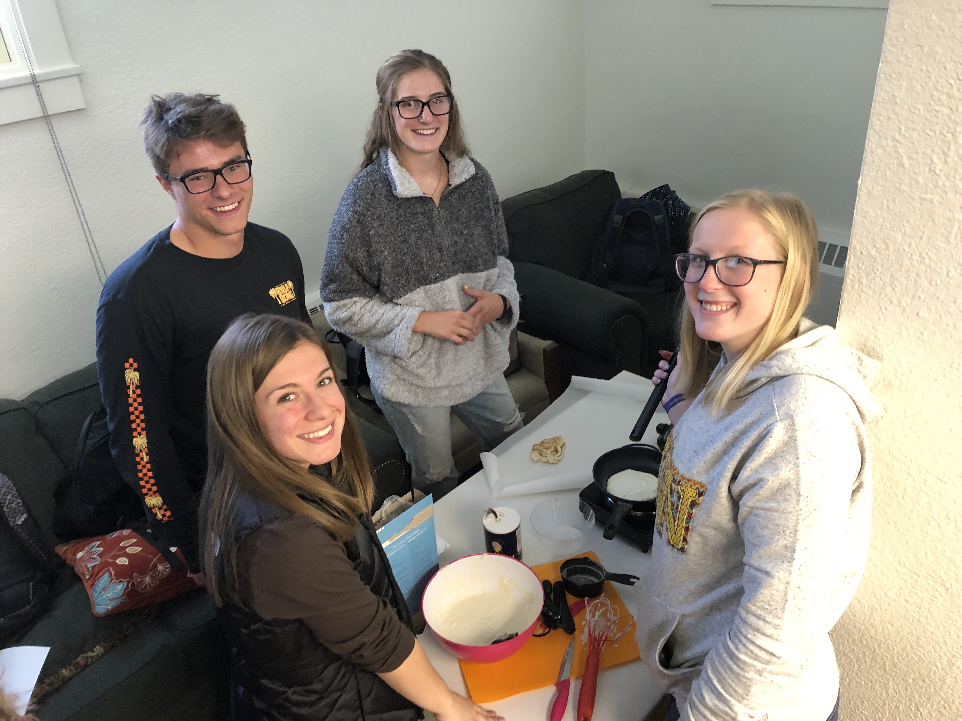 students try a recipe during a class