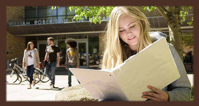 student studies outside of Coe Library