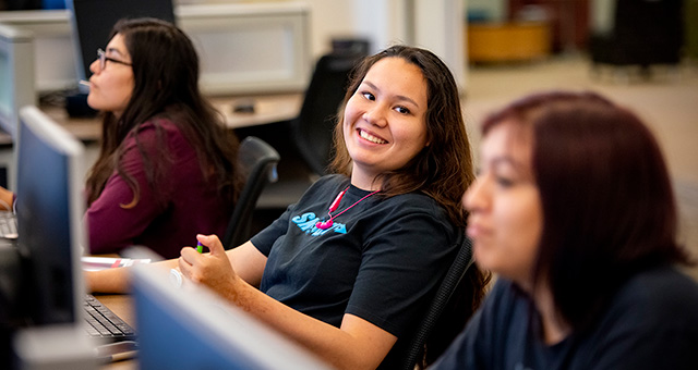 two students collaborate during study