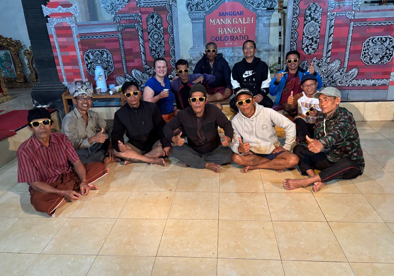 Gamelan ensemble wearing Wyoming Cowboy sunglasses