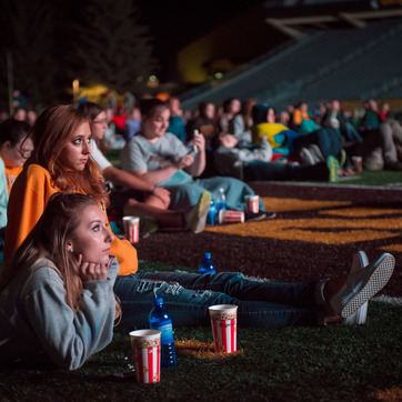 students watching a movie outdoors at the Arena Auditorium at UW