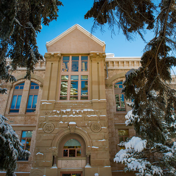 Old main with trees framing the edges