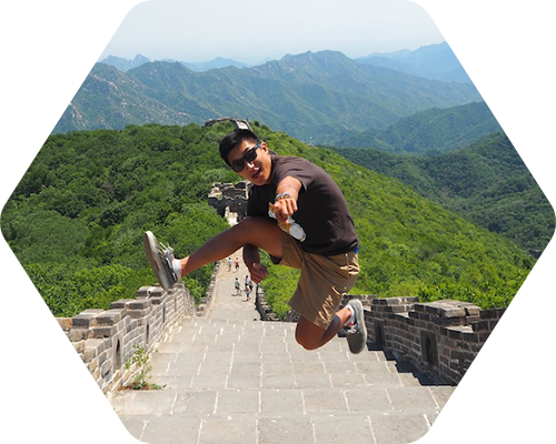 Student jumping at Great Wall