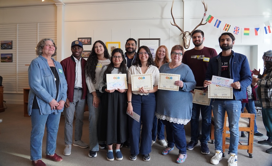 international community member group photo of award winners for flavor fest