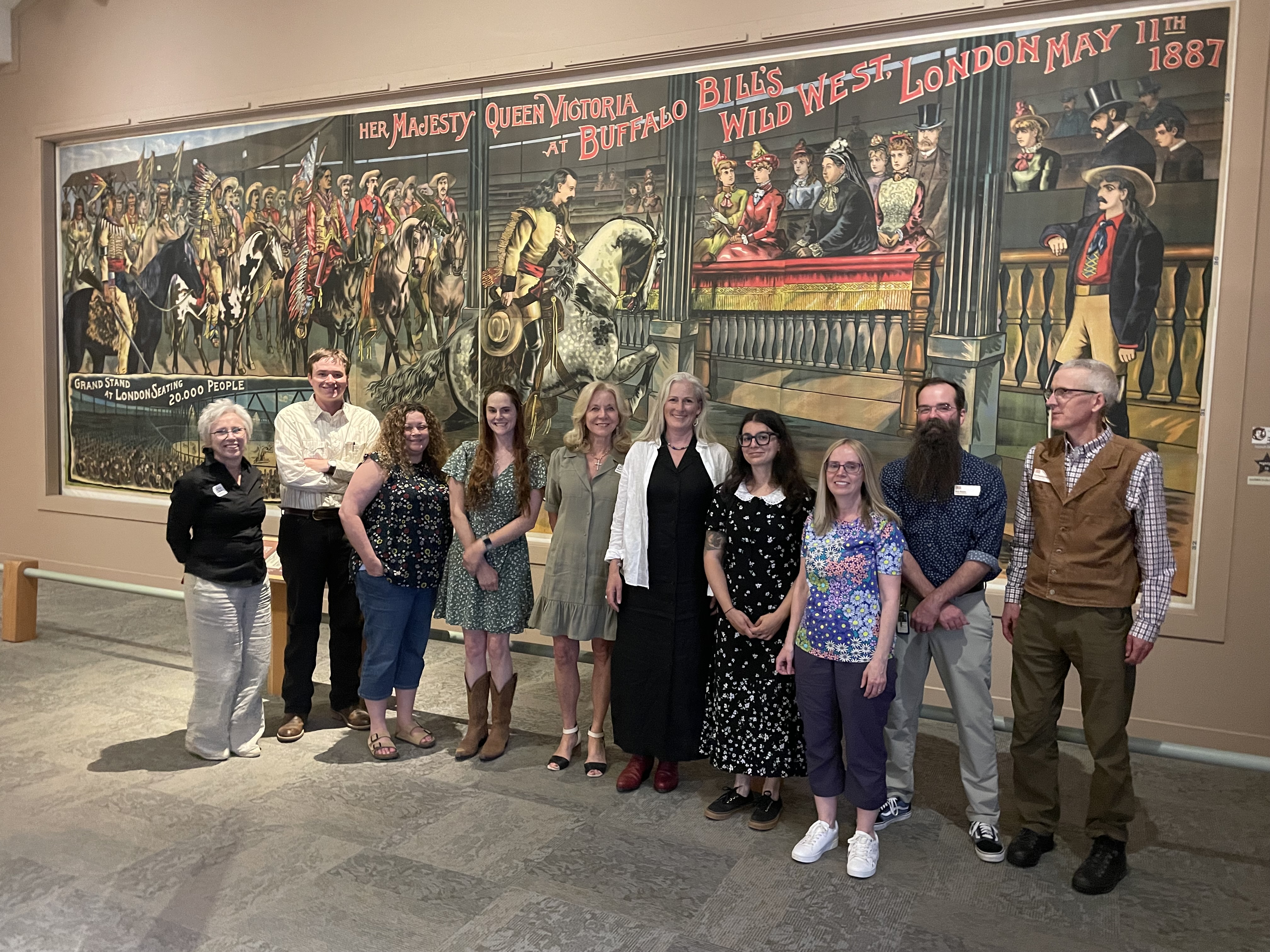A group of faculty from UW and Cardiff in front of Buffalo Bill sign