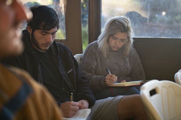 Two UWyo students listening to a lecture at La Laguna University